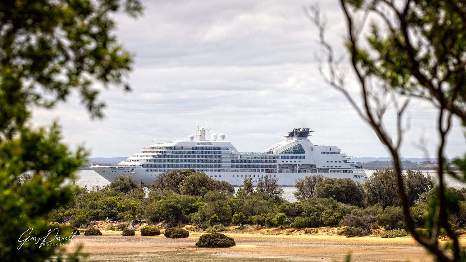 Ship cruises into town