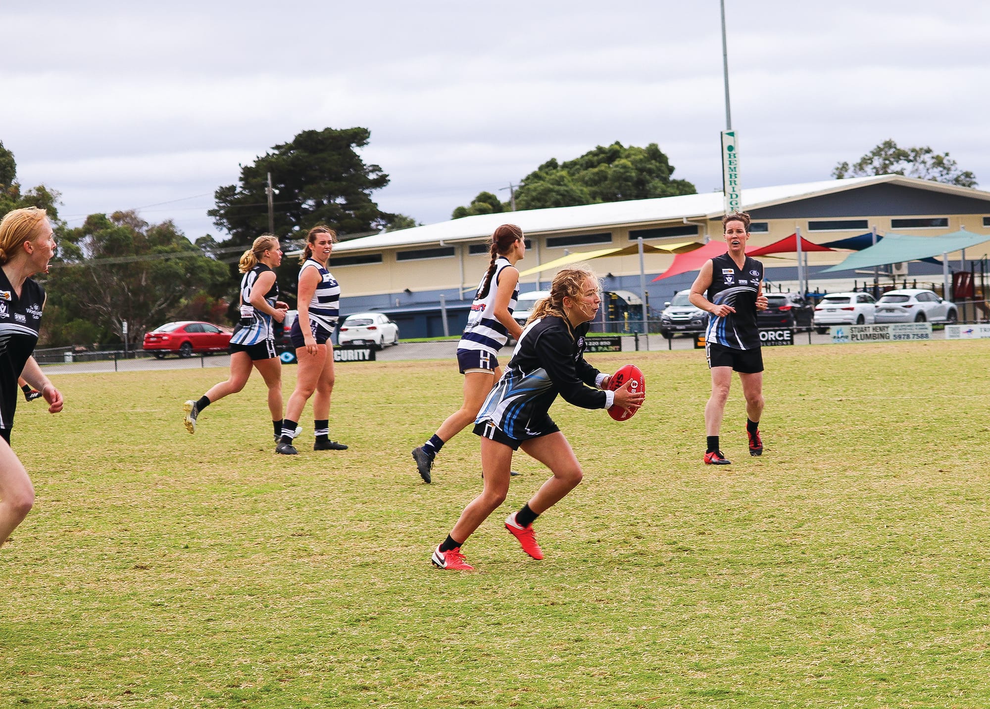 Breakers win in windy conditions