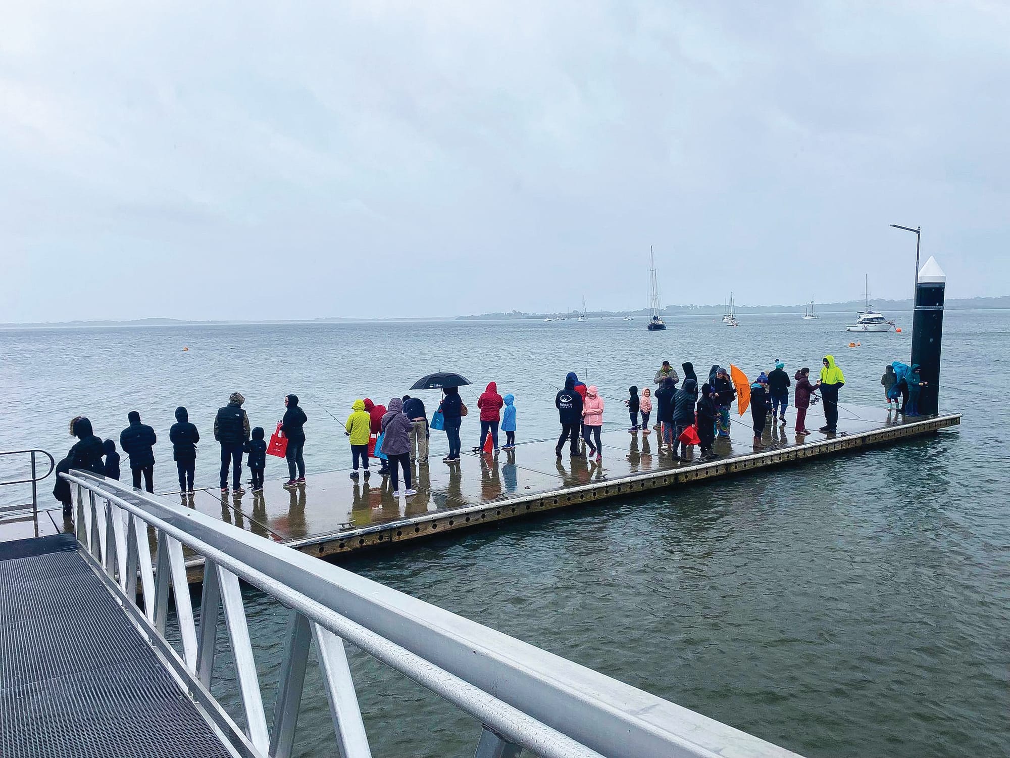Rhyll celebrates: damp boat ramp opening