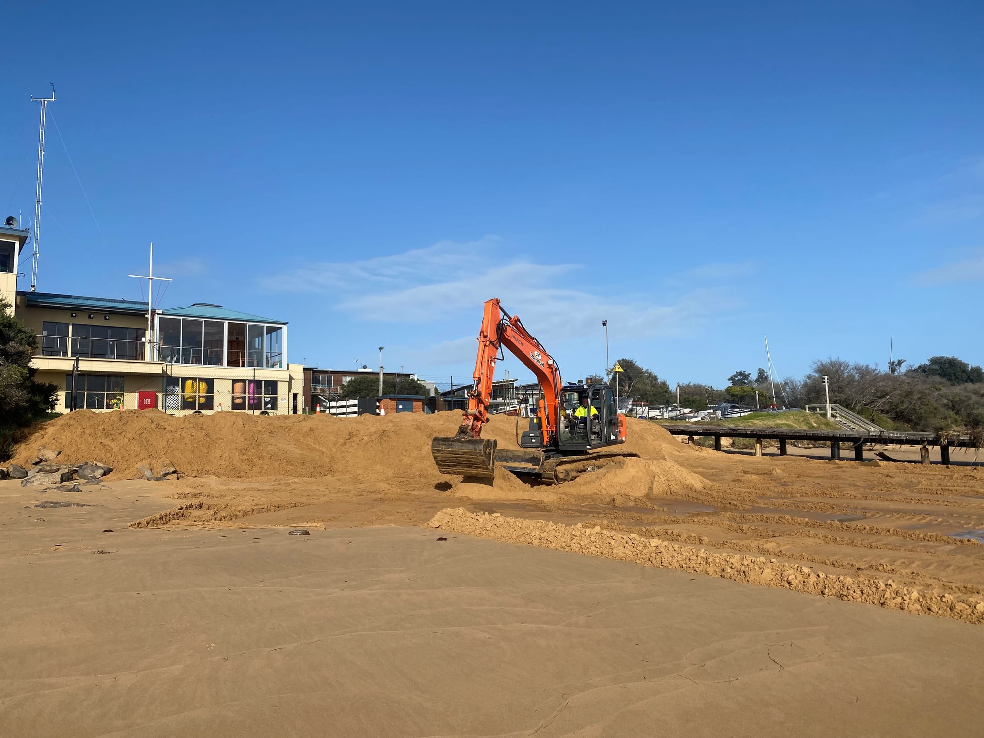 Yacht club shored up with temporary sand ridge