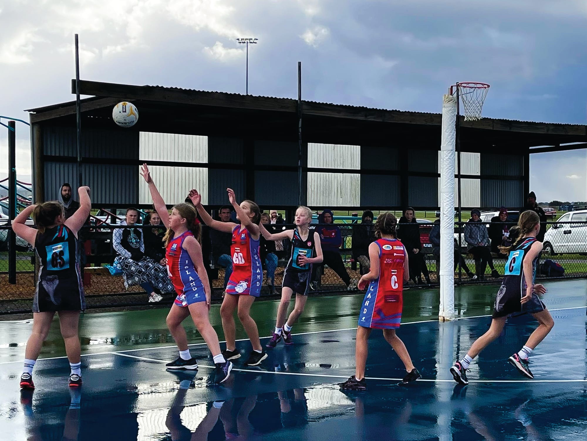 Weather did not dampen the spirits of our Island girls!