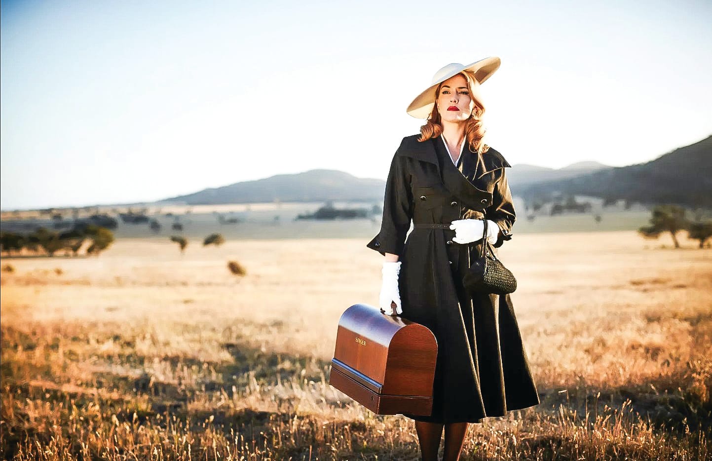 The Dressmaker, the journalist and the playwright