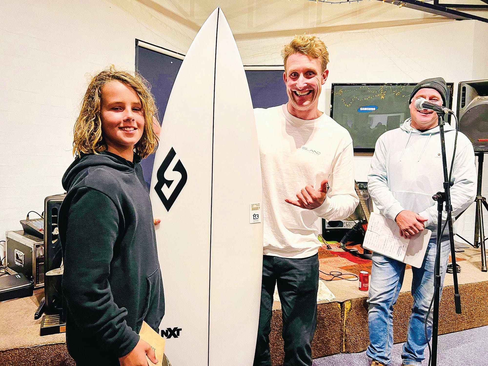 Smiles all round for community surfing spirit