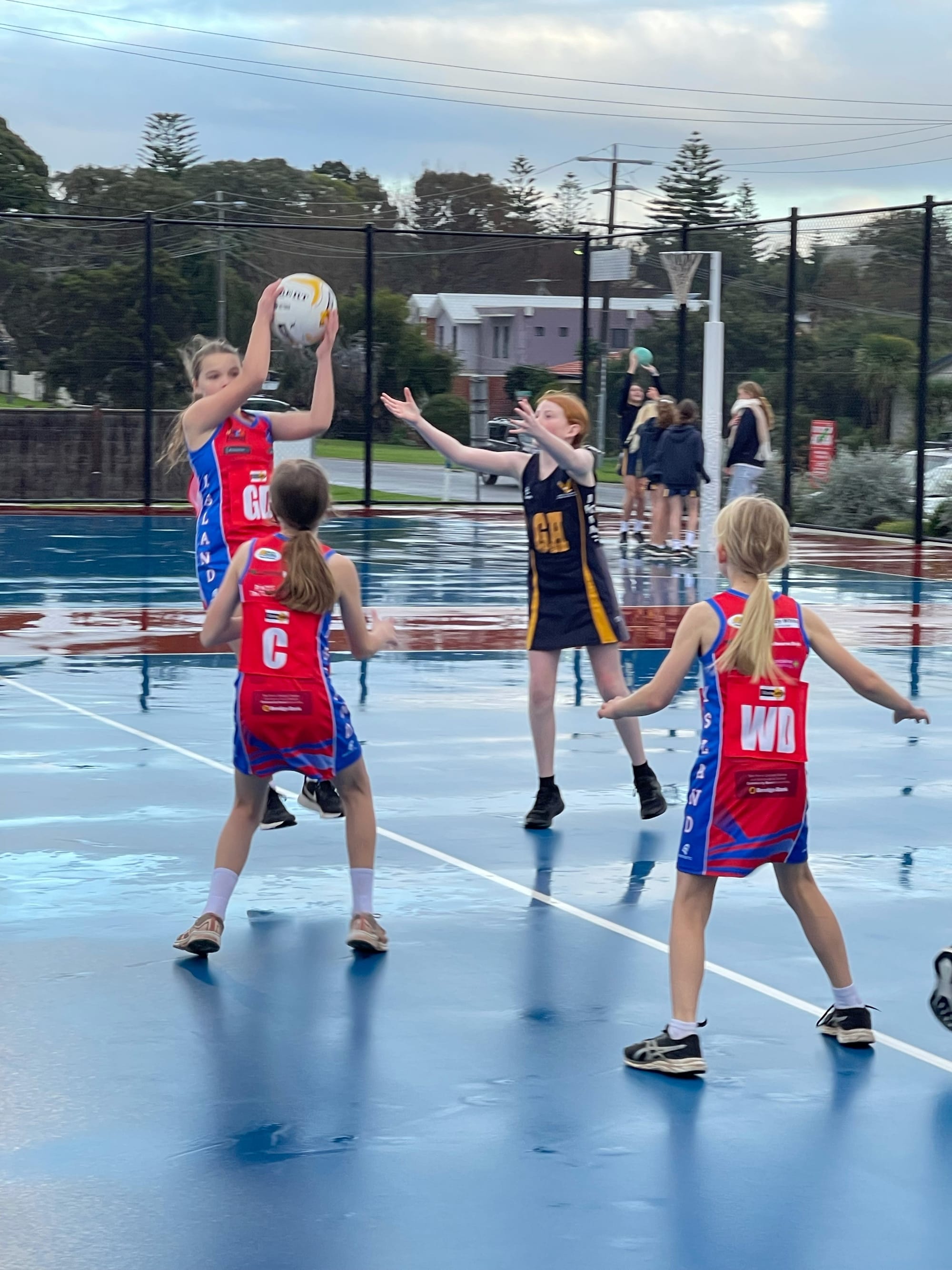 Netballers battle cold and wet conditions