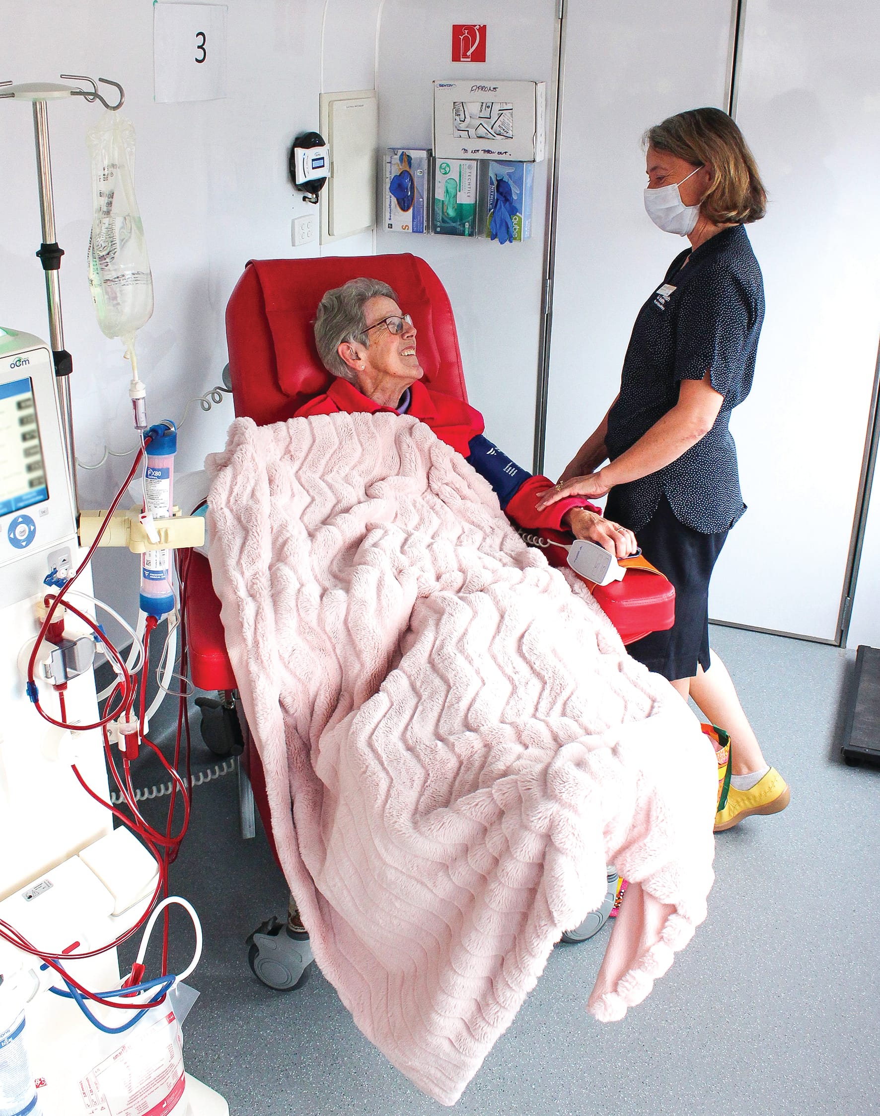 Patients get on the dialysis bus