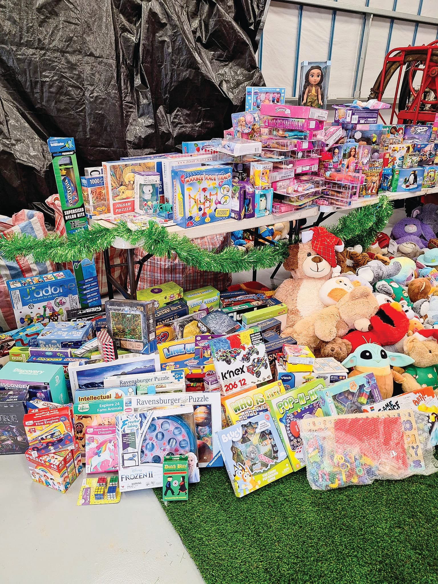 There were ten of thousands of dollars worth of toys and vouchers donated by the participants of the Toy Run. Photos courtesy of Samantha Halstead, Dead4Eva Designs.
