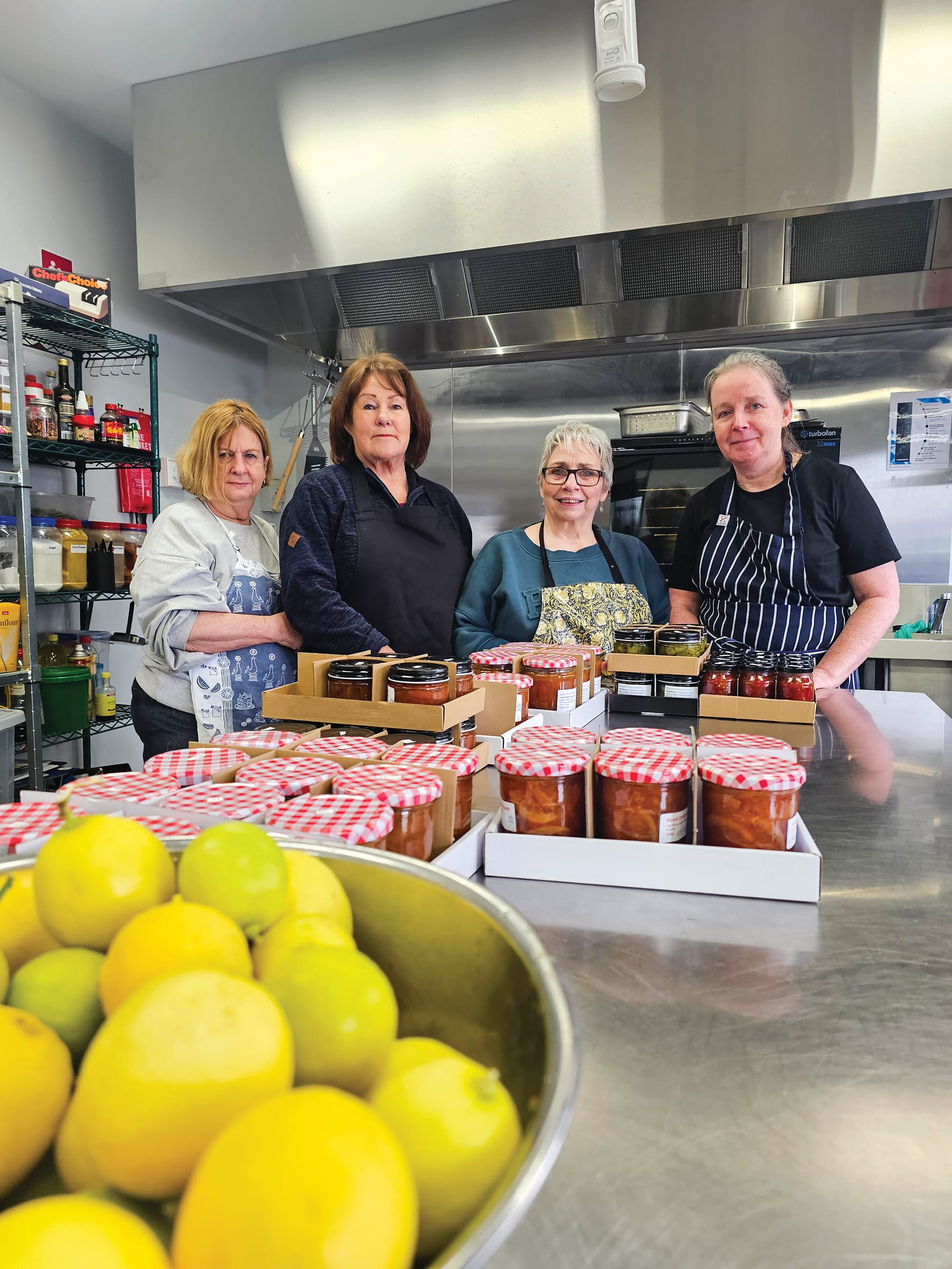 From left: Christine Robertson, Sue Tanirau, Keitha Griggs and Rosemary Deakin – some members of PICAL's Preserve Group in the kitchen.