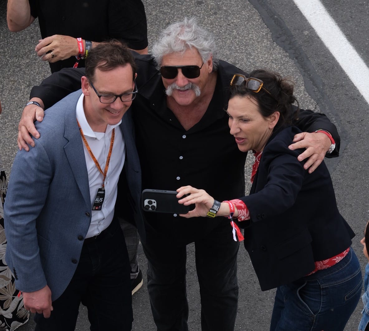 Tourism Minister Steve Dimopoulos and Member for Bass Jordan Crugnale (right) snap a photo with AFL legend Robert DiPierdomenico. Photo: Nici Cahill, Snapshot Photography.