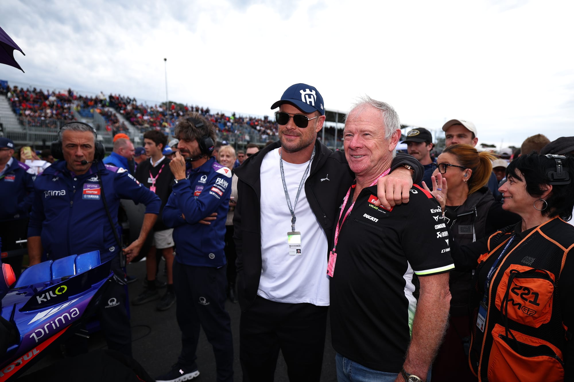 Chris Hemsworth with his father Craig on the MotoGP grid. Photo courtesy of AGPC.
