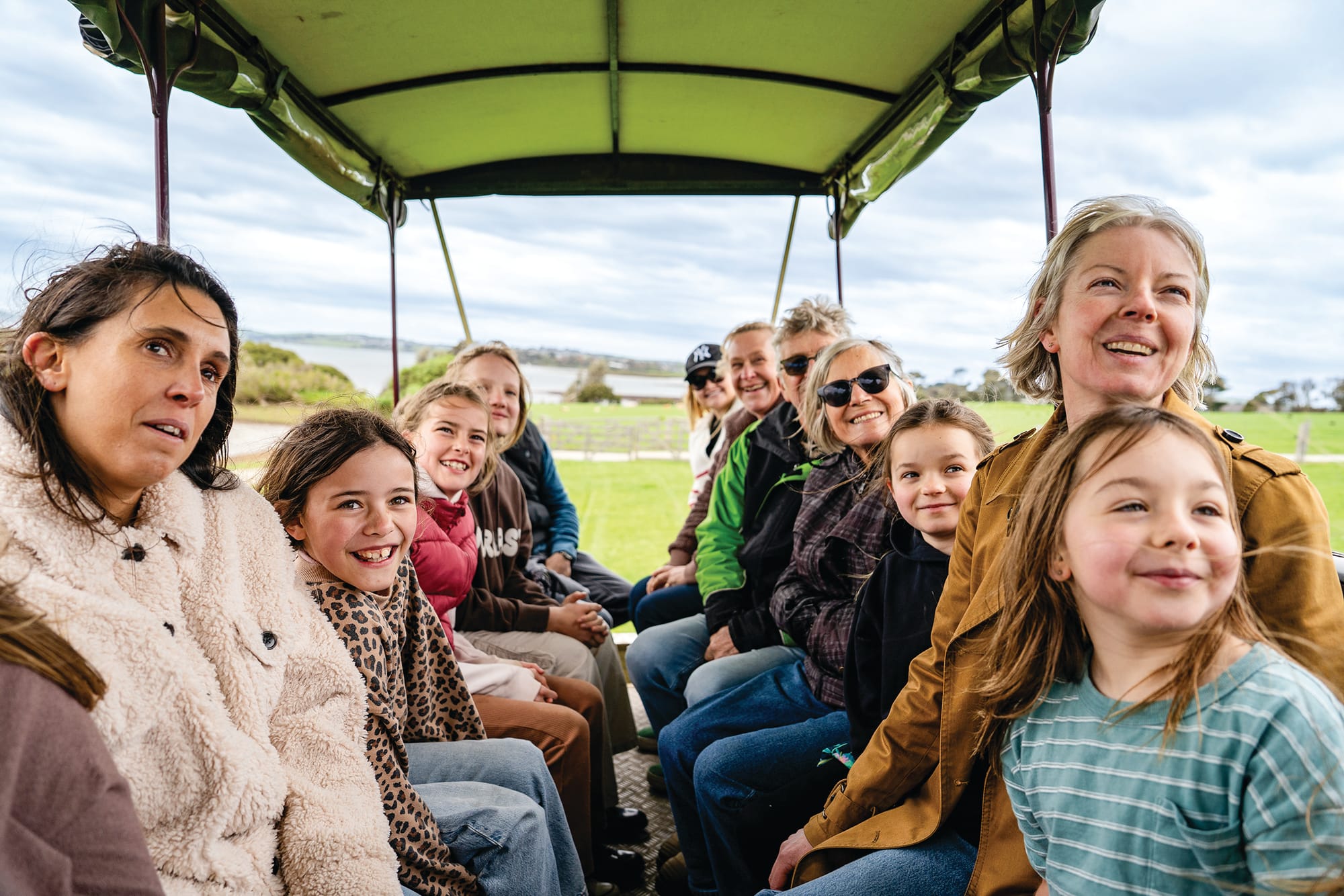 As part of the new experience, visitors to Churchill Island can ride on board a tractor to meet and feed Highland cattle in an experience that blends nature and history.
