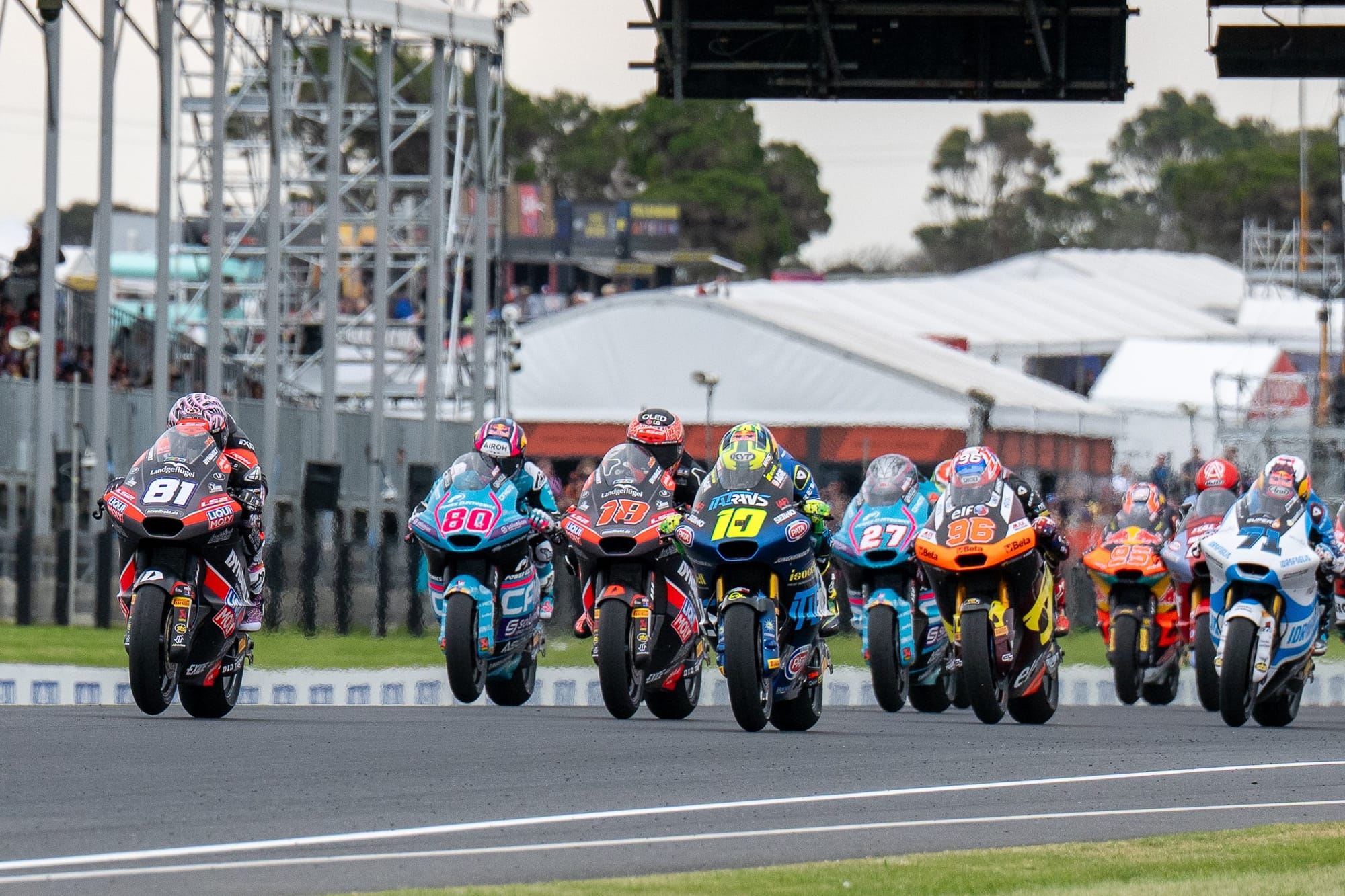 The start of this year’s Moto2 final race, won by Australia rider Senna Agius (81).  Photo: IanR Photography.