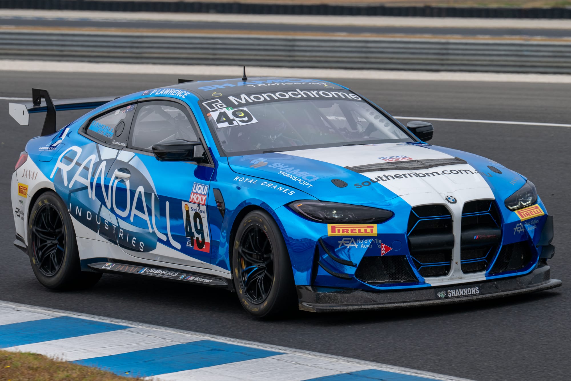 Sports cars sprint at circuit