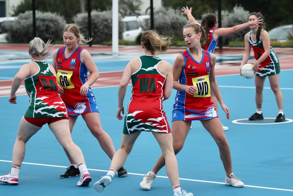 Players challenged: blustery winds and slippery courts - C Grade post image