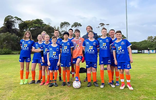 Soccer socks up for Orange round post image