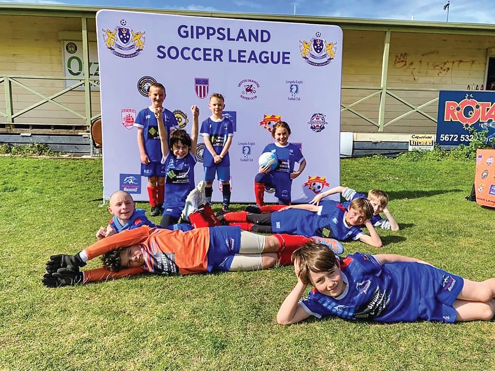 Mini Roos action on the field post image