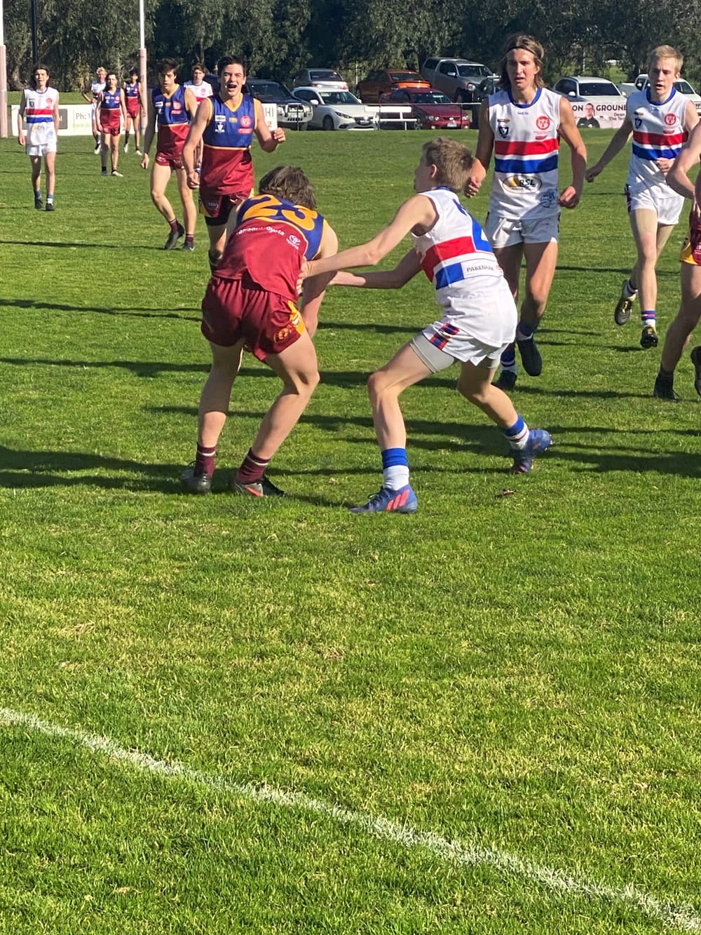 U16s hold on to win post image