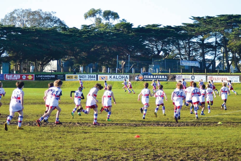 U10s Reds - Footy juniors battle it out in Derby Day post image
