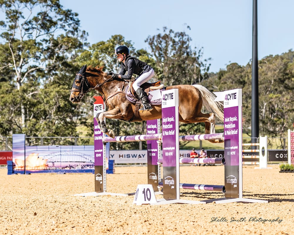 Olivia takes win in show-jumping championship post image