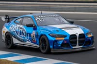 Sports cars sprint at circuit post image